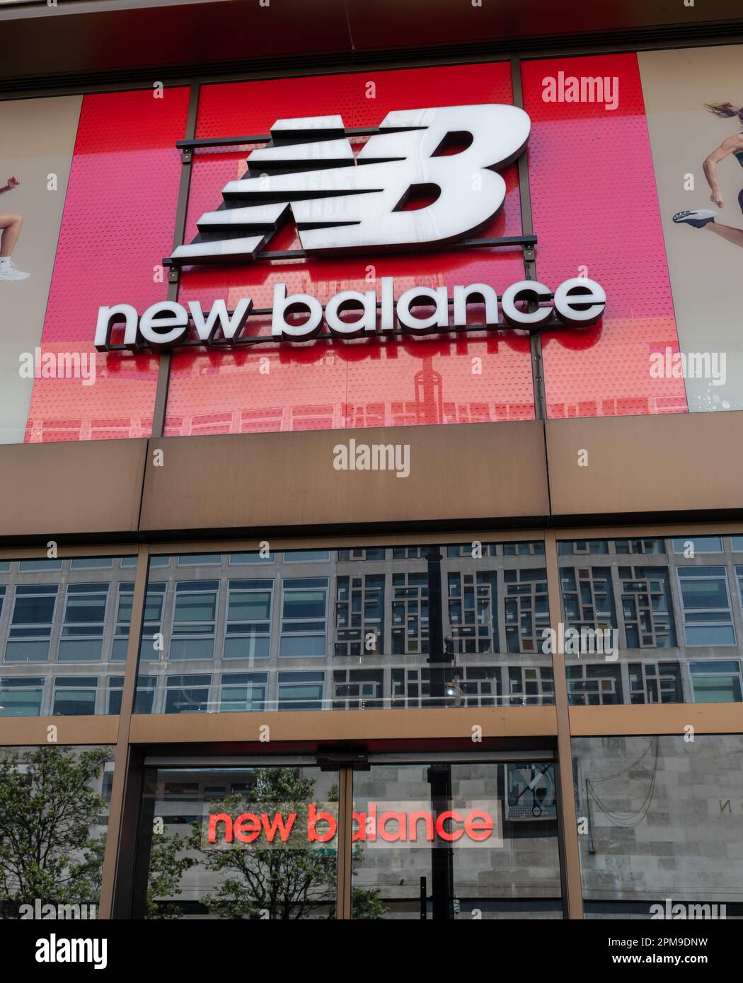 London. UK- 04.09.2023. The New Balance retail store on Oxford Street  showing the company name sign and logo Stock Photo - Alamy