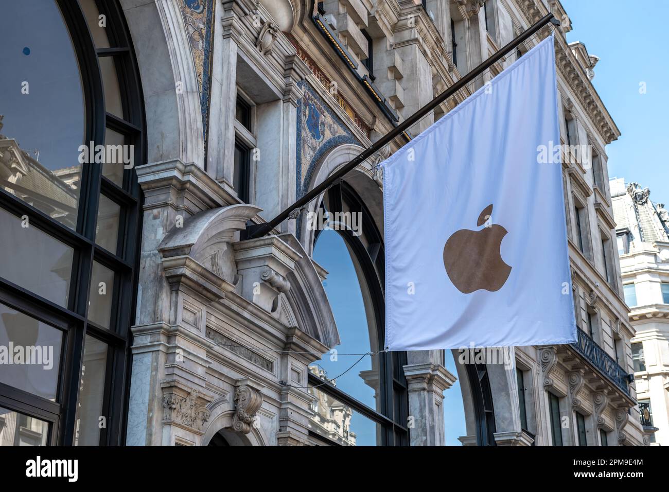 London. UK- 04.09.2023. The Apple logo on a flag on the facade of its Regent Street store. Stock Photo