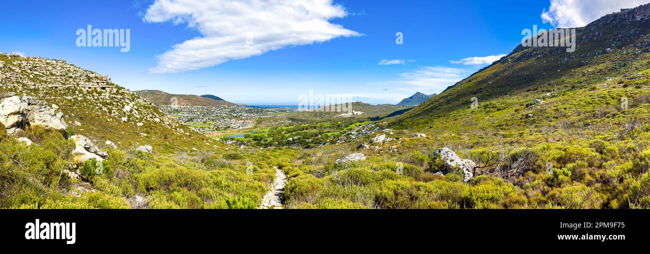 Dirt Track hiking paths on top of a mountain by the coast in Cape Town Stock Photo