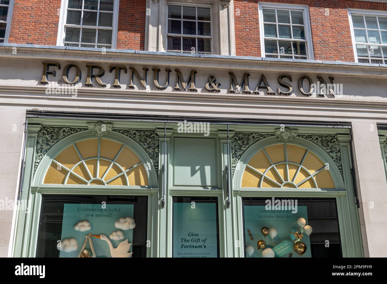 London. UK- 04.09.2023. The name sign on the facade of the famous luxury department store Fortnum and Mason in Piccadilly. Stock Photo
