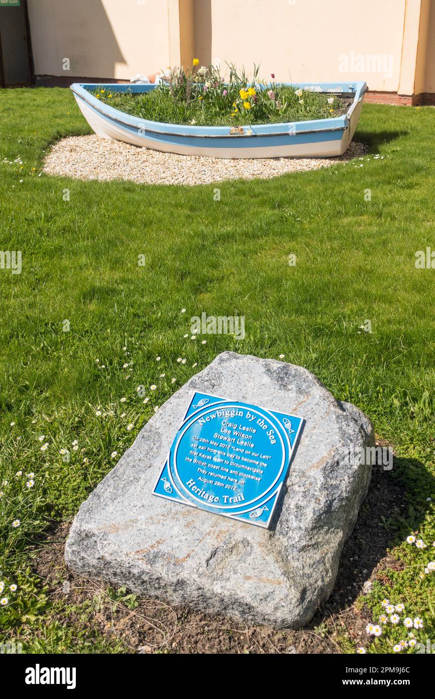 Blue plaque commemorating the first kayak team to circumnavigate the British coastline anticlockwise. Newbiggin by the Sea, Northumberland, England. Stock Photo