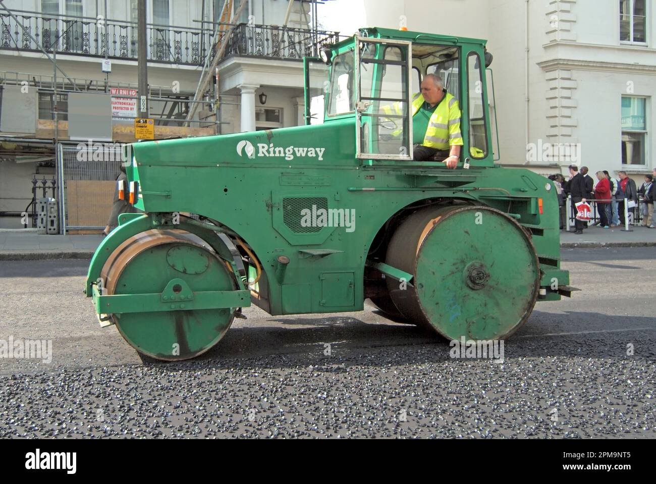 Ringway highway resurfacing business a road roller machine driver at