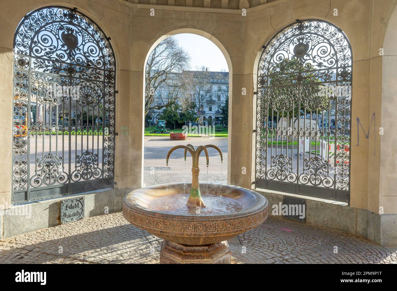 Wiesbaden, Germany - April 4, 2023: The Kochbrunnen (in German: boil fountain) in Wiesbaden is the most famous hot spring in city. It is a sodium chlo Stock Photo