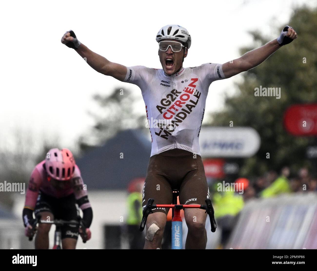 Overijse, Belgium. 12th Apr, 2023. French Dorian Godon of AG2R Citroen celebrates as he crosses the finish line to win, before Irish Ben Healy of EF Education-EasyPost the sprint at the finish of the men's 'Brabantse Pijl' one day cycling race, 205,1km from Leuven to Overijse on Wednesday 12 April 2023. BELGA PHOTO TOM GOYVAERTS Credit: Belga News Agency/Alamy Live News Stock Photo