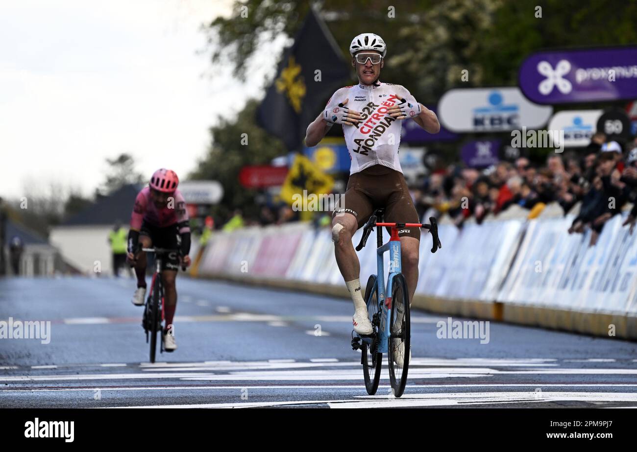 Overijse, Belgium. 12th Apr, 2023. French Dorian Godon of AG2R Citroen celebrates as he crosses the finish line to win, before Irish Ben Healy of EF Education-EasyPost (L) the sprint at the finish of the men's 'Brabantse Pijl' one day cycling race, 205,1km from Leuven to Overijse on Wednesday 12 April 2023. BELGA PHOTO TOM GOYVAERTS Credit: Belga News Agency/Alamy Live News Stock Photo