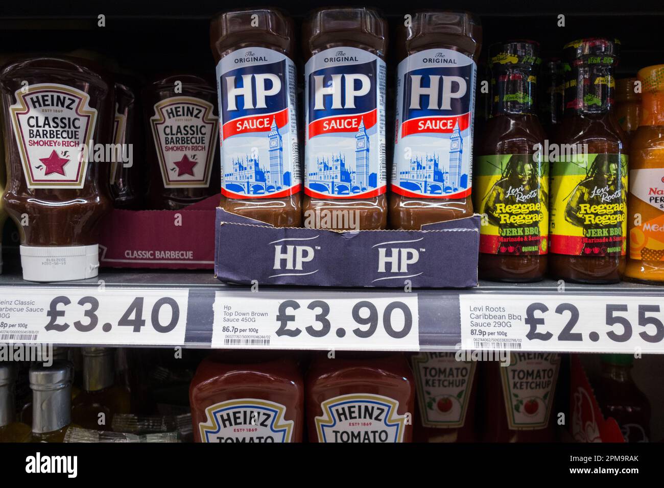 £3.90 HP Sauce bottles on a supermarket shelf Stock Photo