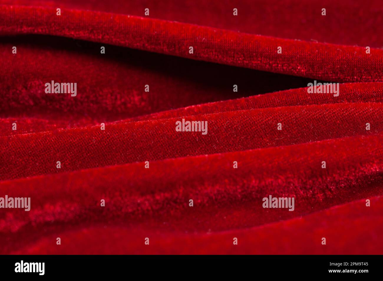 Red velour velvet texture waves hi-res stock photography and images - Alamy