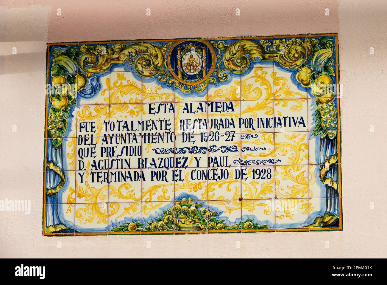 Ceramic Tiled commemorative plaque celebrating the opening of the Alameda park. on the wall of the Baluarte Candelaria , Cadiz, Andalusia, Spain Stock Photo