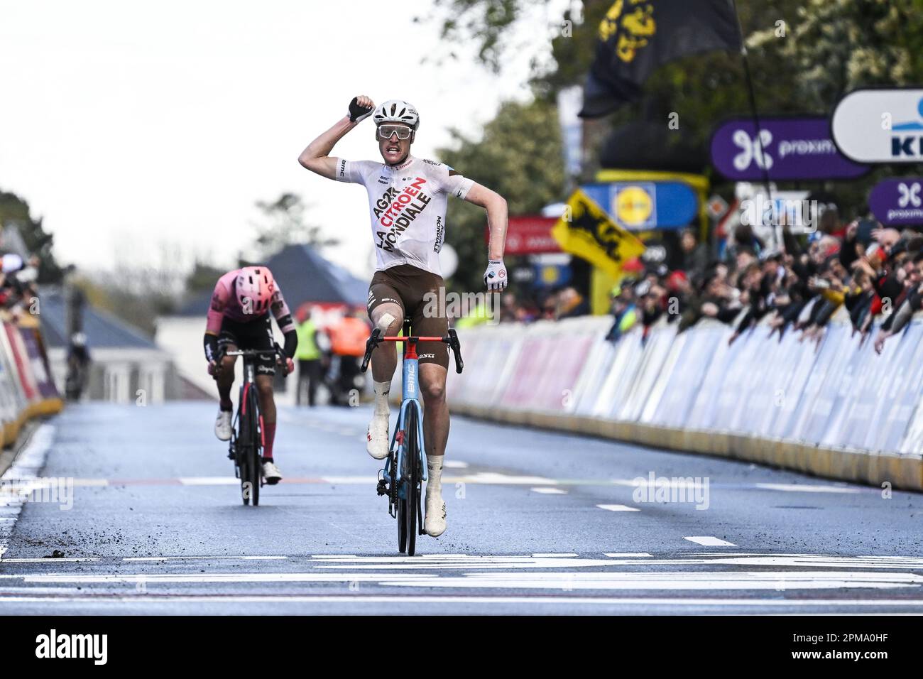 Overijse, Belgium. 12th Apr, 2023. French Dorian Godon of AG2R Citroen celebrates as he crosses the finish line to win, before Irish Ben Healy of EF Education-EasyPost the sprint at the finish of the men's 'Brabantse Pijl' one day cycling race, 205,1km from Leuven to Overijse on Wednesday 12 April 2023. BELGA PHOTO TOM GOYVAERTS Credit: Belga News Agency/Alamy Live News Stock Photo