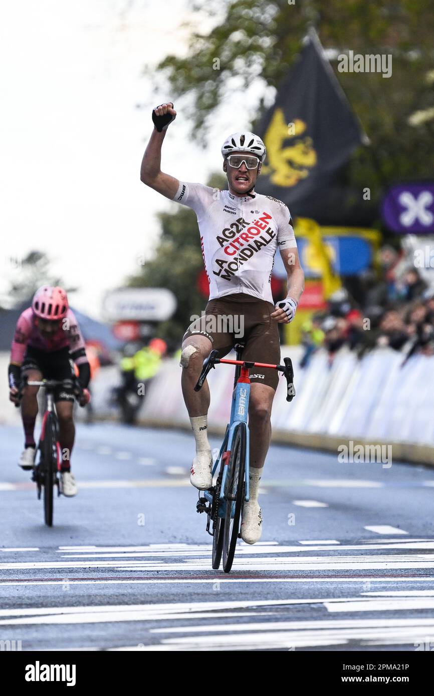 Overijse, Belgium. 12th Apr, 2023. French Dorian Godon of AG2R Citroen celebrates as he crosses the finish line to win, before Irish Ben Healy of EF Education-EasyPost the sprint at the finish of the men's 'Brabantse Pijl' one day cycling race, 205,1km from Leuven to Overijse on Wednesday 12 April 2023. BELGA PHOTO TOM GOYVAERTS Credit: Belga News Agency/Alamy Live News Stock Photo