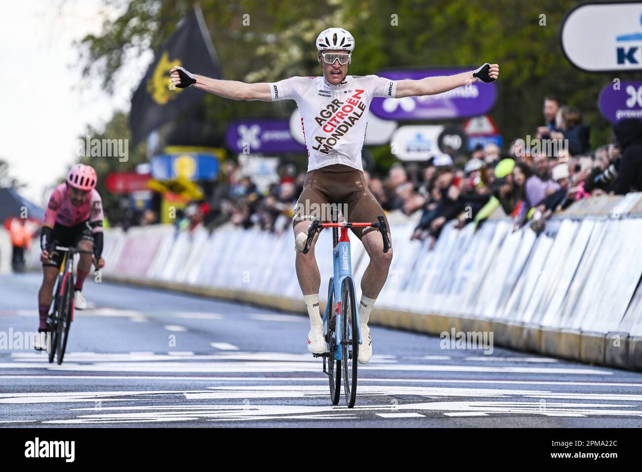 Overijse, Belgium. 12th Apr, 2023. French Dorian Godon of AG2R Citroen celebrates as he crosses the finish line to win, before Irish Ben Healy of EF Education-EasyPost the sprint at the finish of the men's 'Brabantse Pijl' one day cycling race, 205,1km from Leuven to Overijse on Wednesday 12 April 2023. BELGA PHOTO TOM GOYVAERTS Credit: Belga News Agency/Alamy Live News Stock Photo