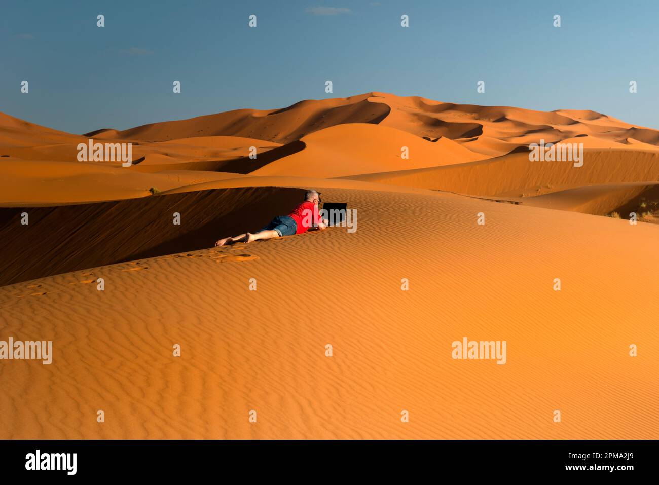 Remote work from the desert Stock Photo