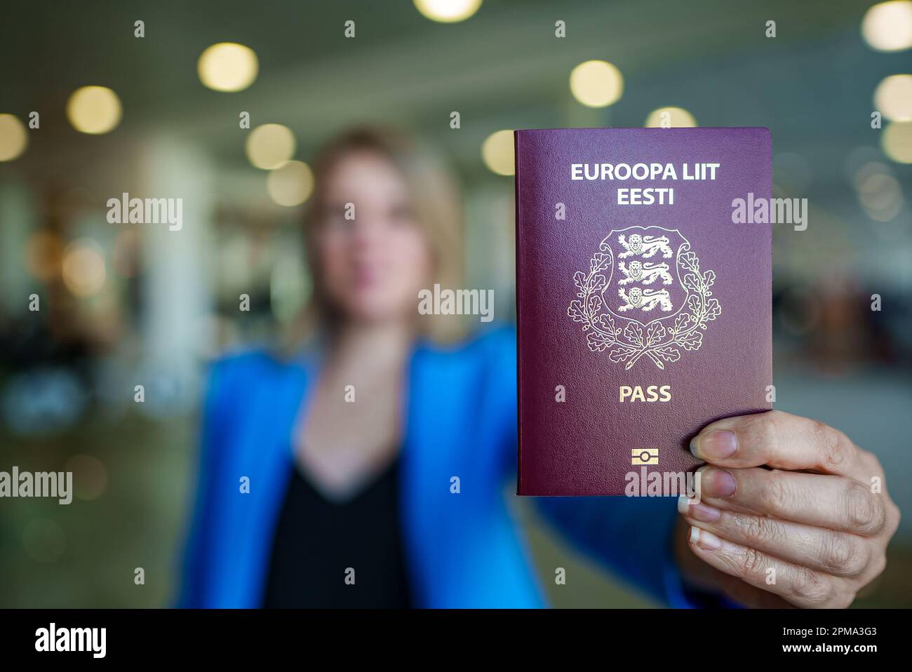 Woman showing europe union passport. Estonian citizenship Stock Photo ...