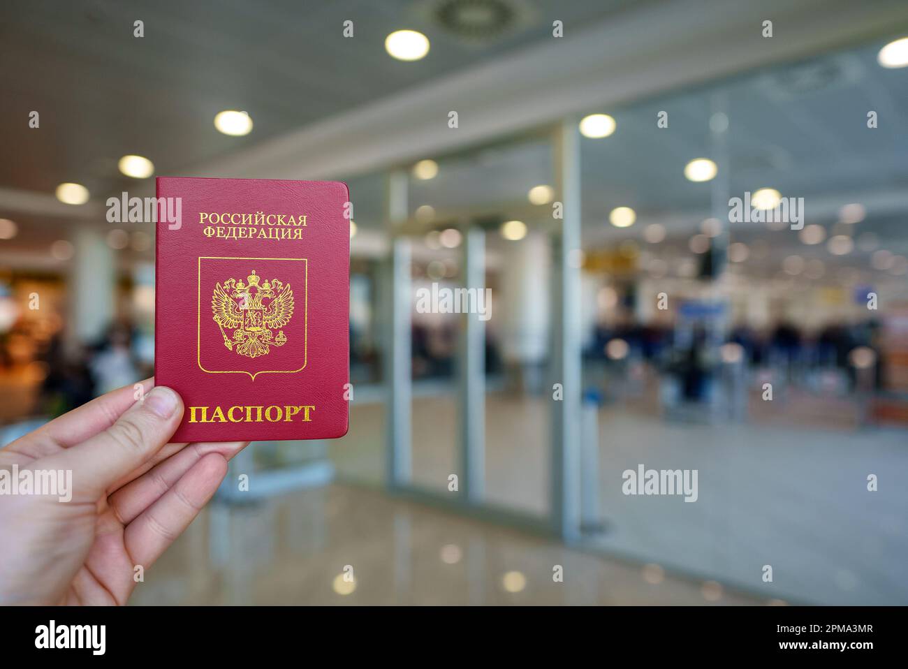 Hand with russian passport hi-res stock photography and images - Alamy