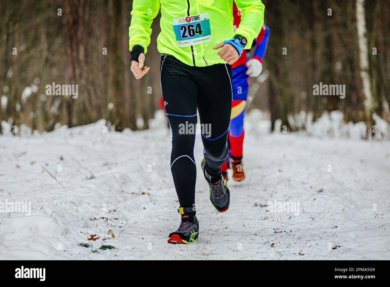 Ekaterinburg, Russia - November 26: male runner run winter trail race in leggings  Kalenji and Asics running shoes Stock Photo - Alamy