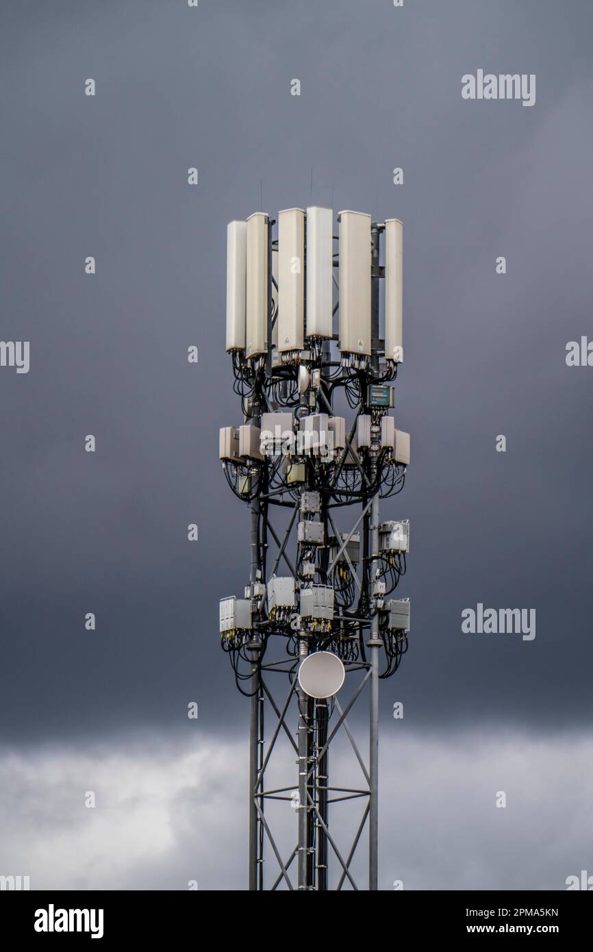 Mobile phone mast with various antenna systems, for mobile phone and other telecommunications, G5 mobile phone standard, Stock Photo