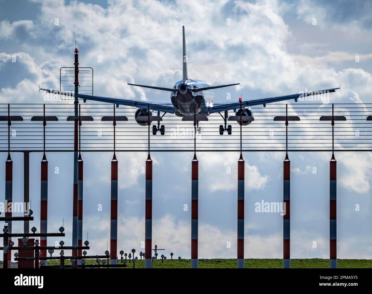 Düsseldorf International Airport, DUS, runway lighting, Runway 05R/23L approach aid, aircraft on approach, Stock Photo