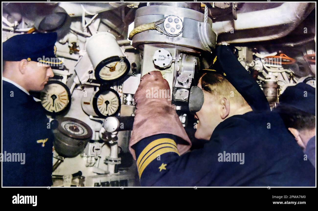 U-BOAT WW2 Nazi Submarine interior on attack mode with periscope up Rare colour image interior action image WWII: German Activities. A German submarine in attack. The Commander positions the periscope for attack 1940s WW2 World War II Second World War Battle of The Atlantic Nazi Kriegsmarine Navy Stock Photo