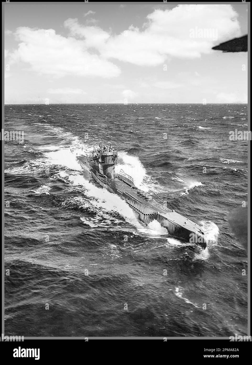 U-BOAT Surrender of Nazi Kriegsmarine German U-boats, WWII. U-249 surrendering on May 9, 1945. U-249 was the first U-boat to surrender after Germany’s surrender. The submarine surrendered to a PB4Y-1 “Liberator” from FAW-7 off Scilly Islands. Official U.S. Navy photograph, Stock Photo