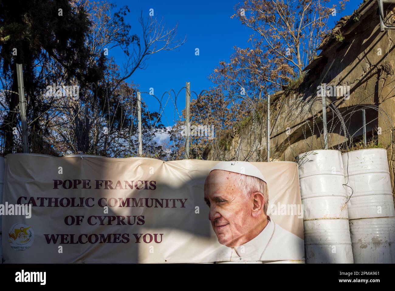 A picture of Pope Francis on the Greek side of the inner city border in Nicosia Municipality, Cyprus Stock Photo