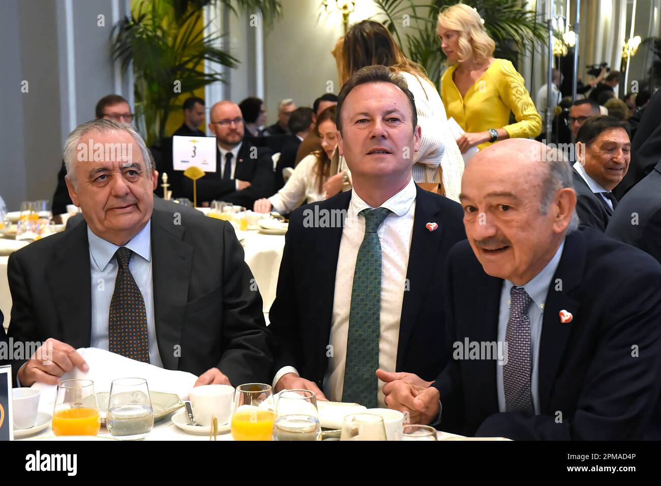 Madrid, Spain. 12th Apr, 2023. Guillermo Blanco Gomez, Minister of Rural Affairs (C) and José María Mazón (R), member of the congress of deputies at the presidential table of the Ritz hotel during the presentation. The president of Cantabria, together with colleagues from the Cantabrian Regionalist Party, presented his candidacy for re-election in Madrid. Credit: SOPA Images Limited/Alamy Live News Stock Photo
