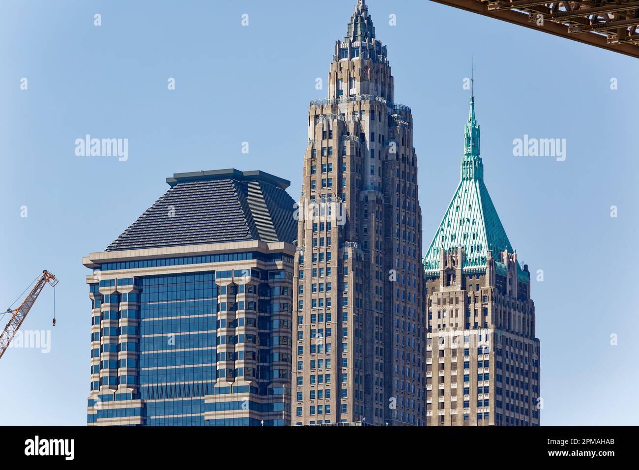 NYC Financial District icons: 60 Wall Street (Deutsch Bank Building), 70 Pine Street (Cities Service Building) and 40 Wall Street (Trump Building). Stock Photo