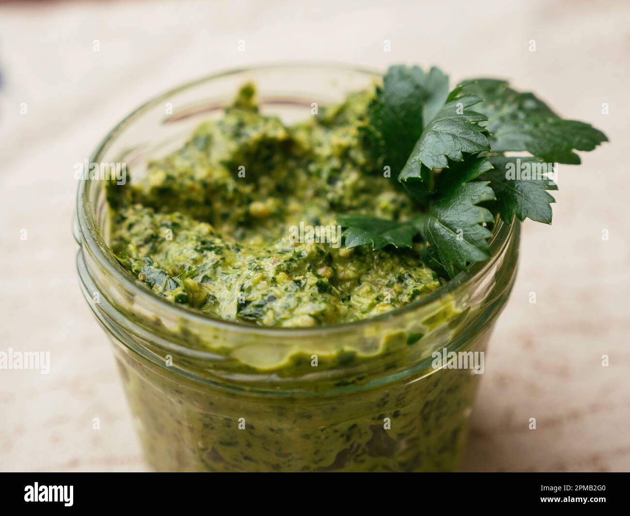 Home made vegan celery leaf pesto in a jar Stock Photo Alamy