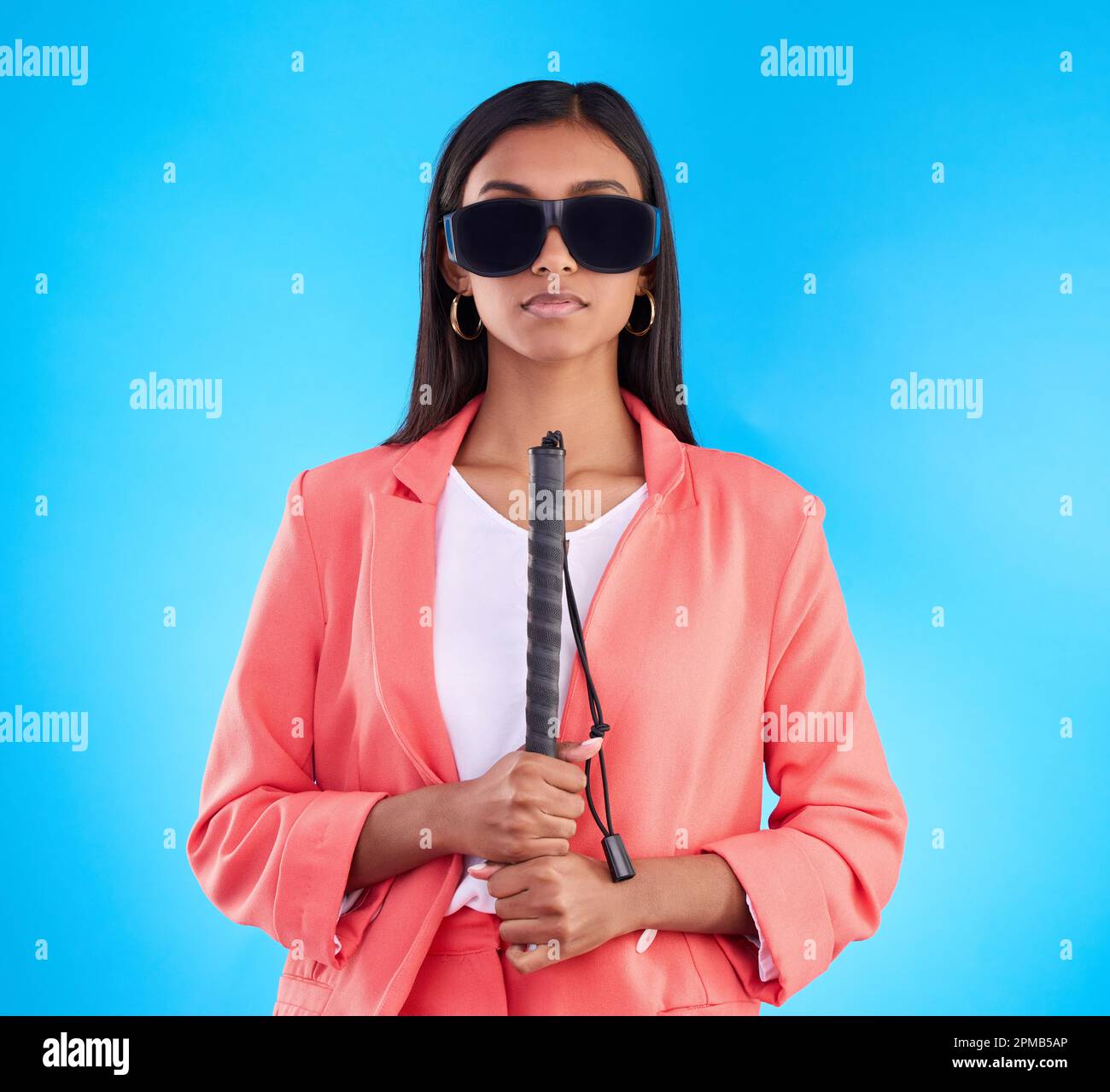 Blind, face and woman with disability in a studio with guide cane for