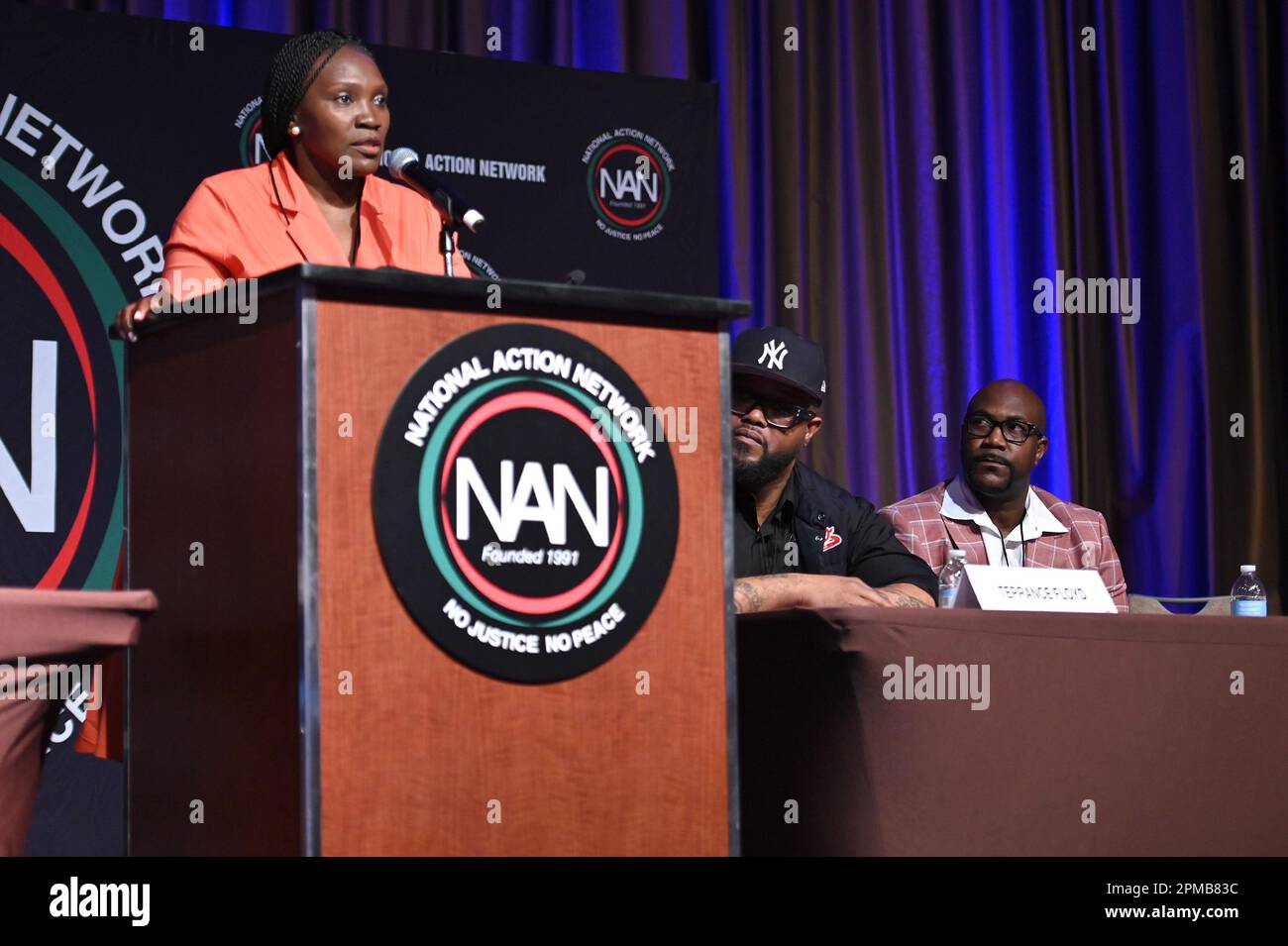 New York, USA. 12th Apr, 2023. Terrence Floyd and Philonise Floyd, brothers of George Floyd, look up at Wanda Cooper Jones, mother of Ahmaud Arbery, speak at the National Action Network (NAN) conference at the Sheraton Hotel, New York, NY, April 12, 2023. (Photo by Anthony Behar/Sipa USA) Credit: Sipa USA/Alamy Live News Stock Photo