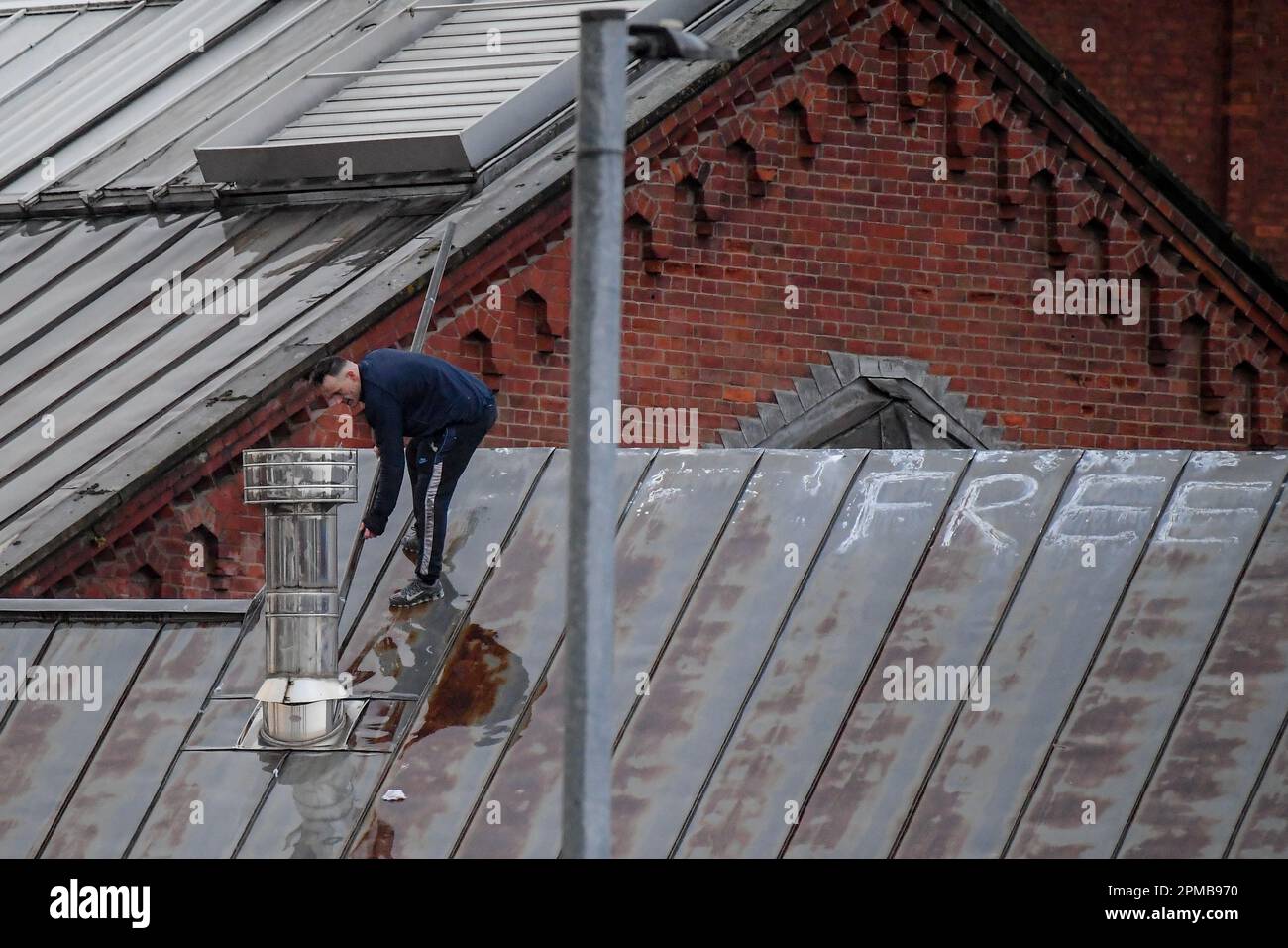 An Inmate makes it up on the roof at HM Prison Manchester aka Strangeways, Manchester, United Kingdom, 12th April 2023  (Photo by Ben Roberts/News Images) Stock Photo