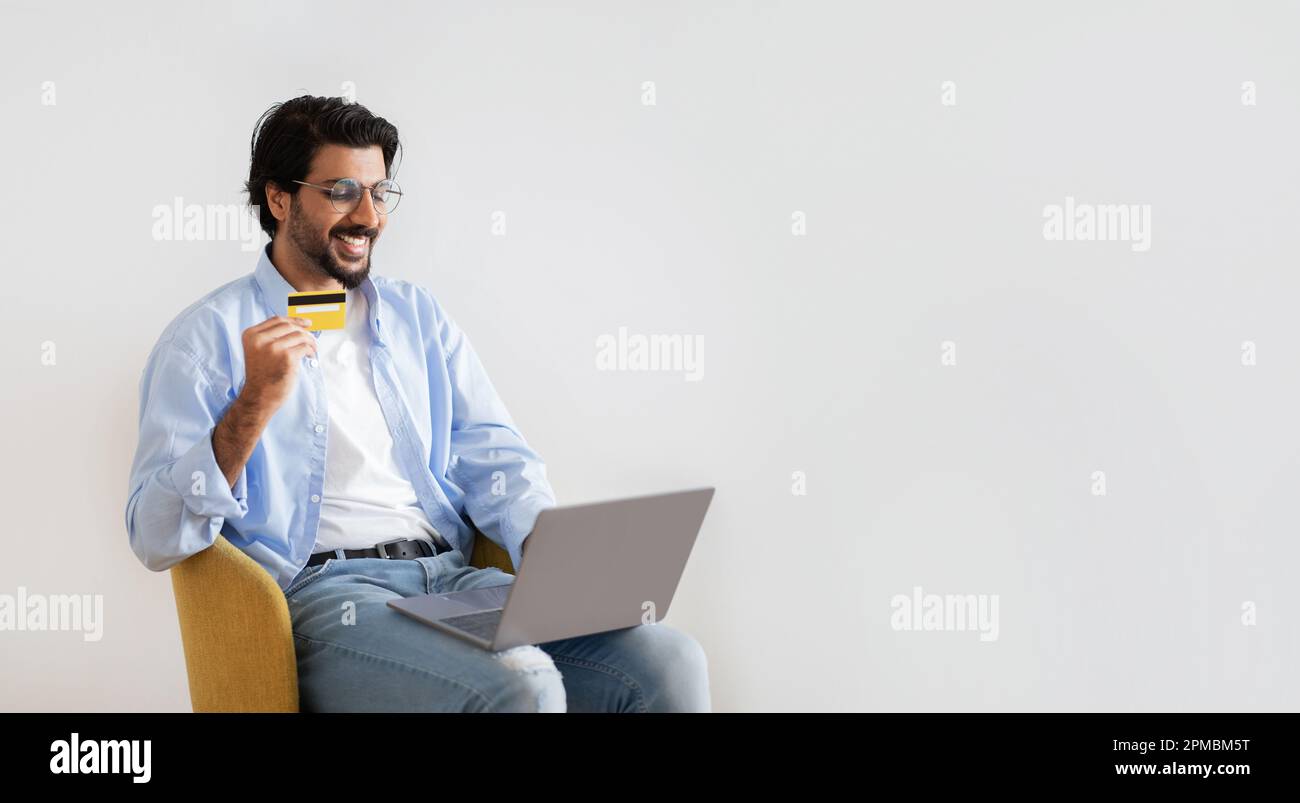 Handsome man in glasses uses hi-res stock photography and images - Alamy
