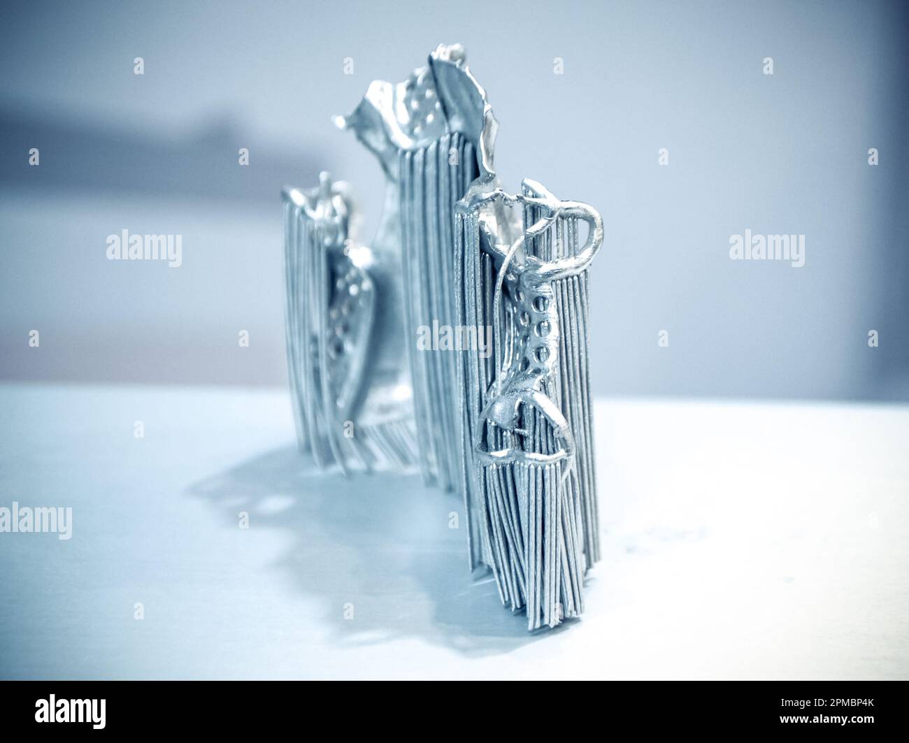 Object printed on metal 3d printer. Dental crowns printed in laser