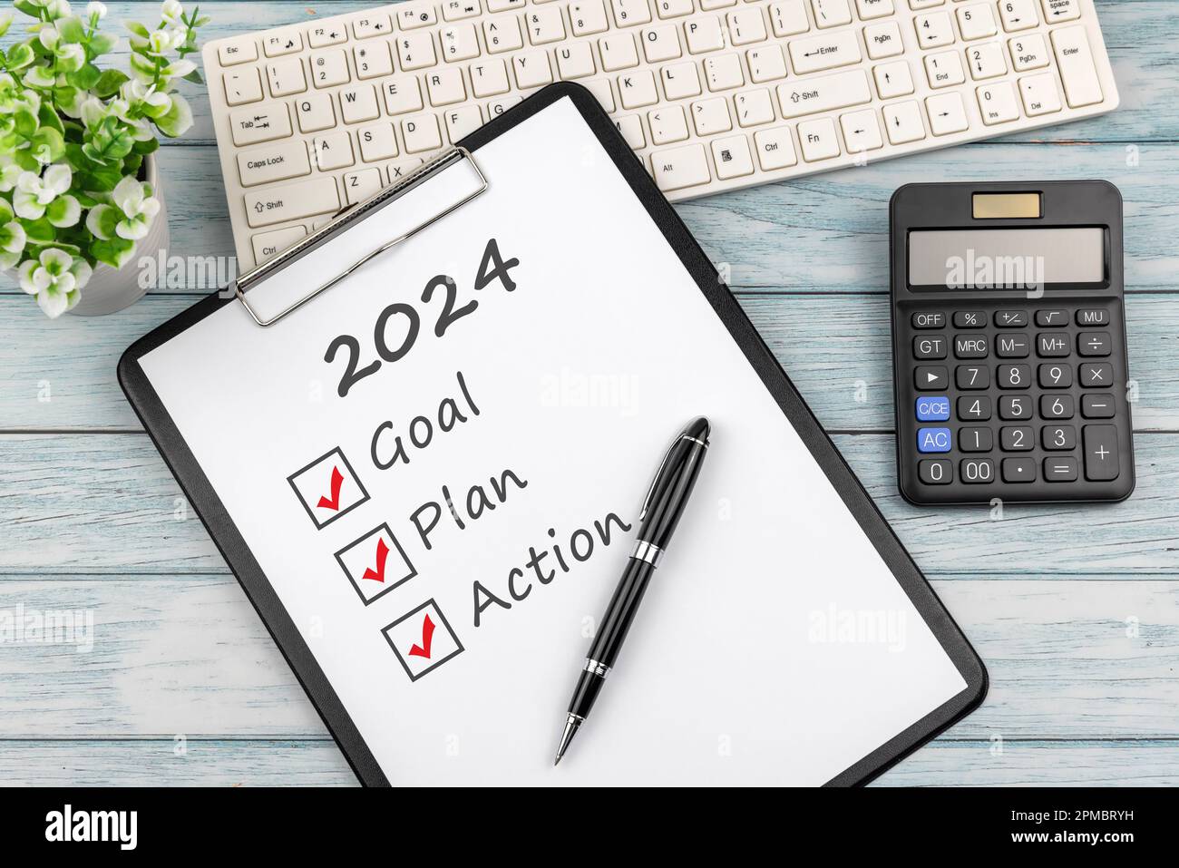 Clipboard with text 2024 goal, plan, action checklist Stock Photo Alamy