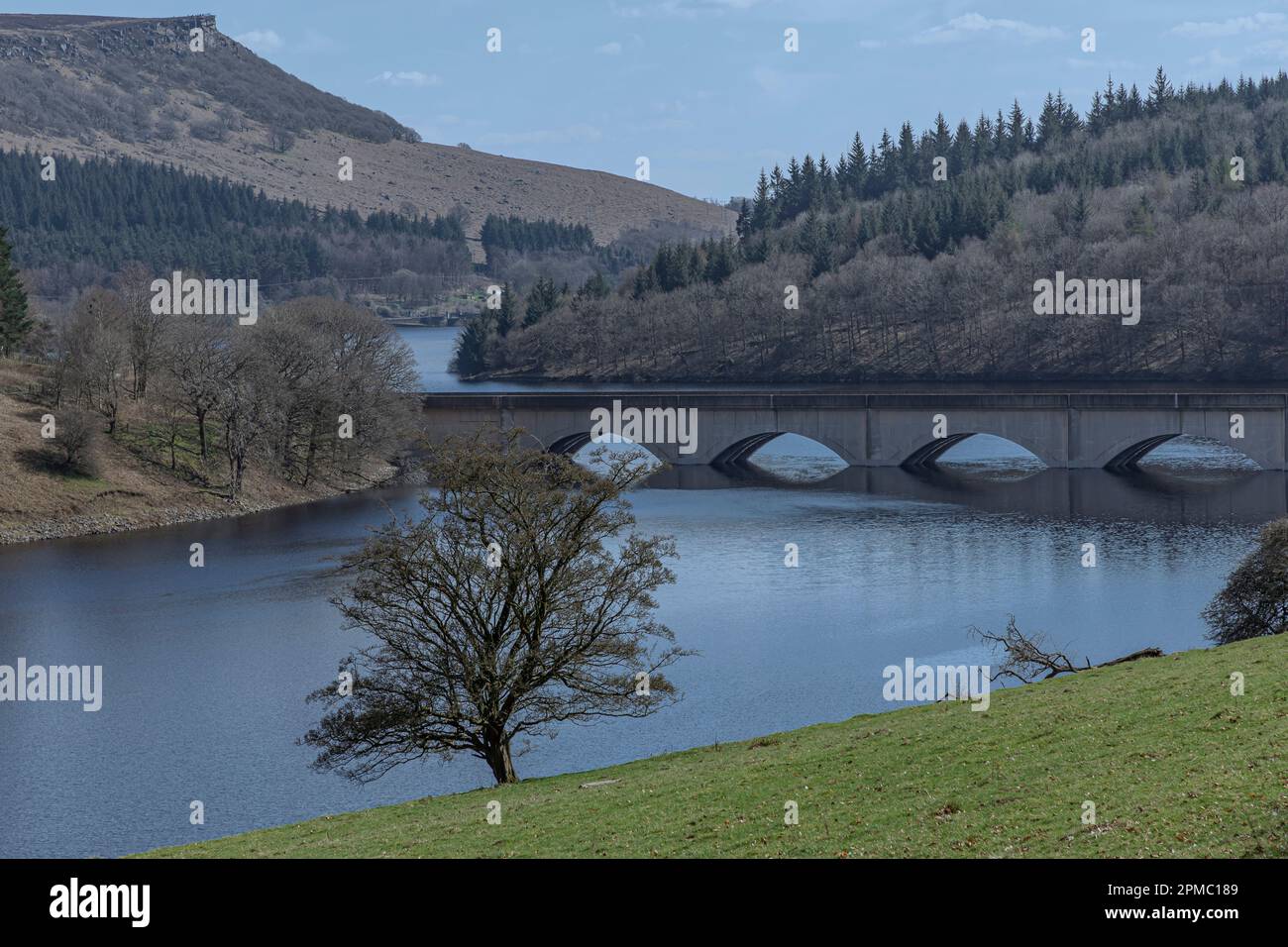 Bridge crossing Lady Bower Reservoir in Spring on a cool day Stock Photo