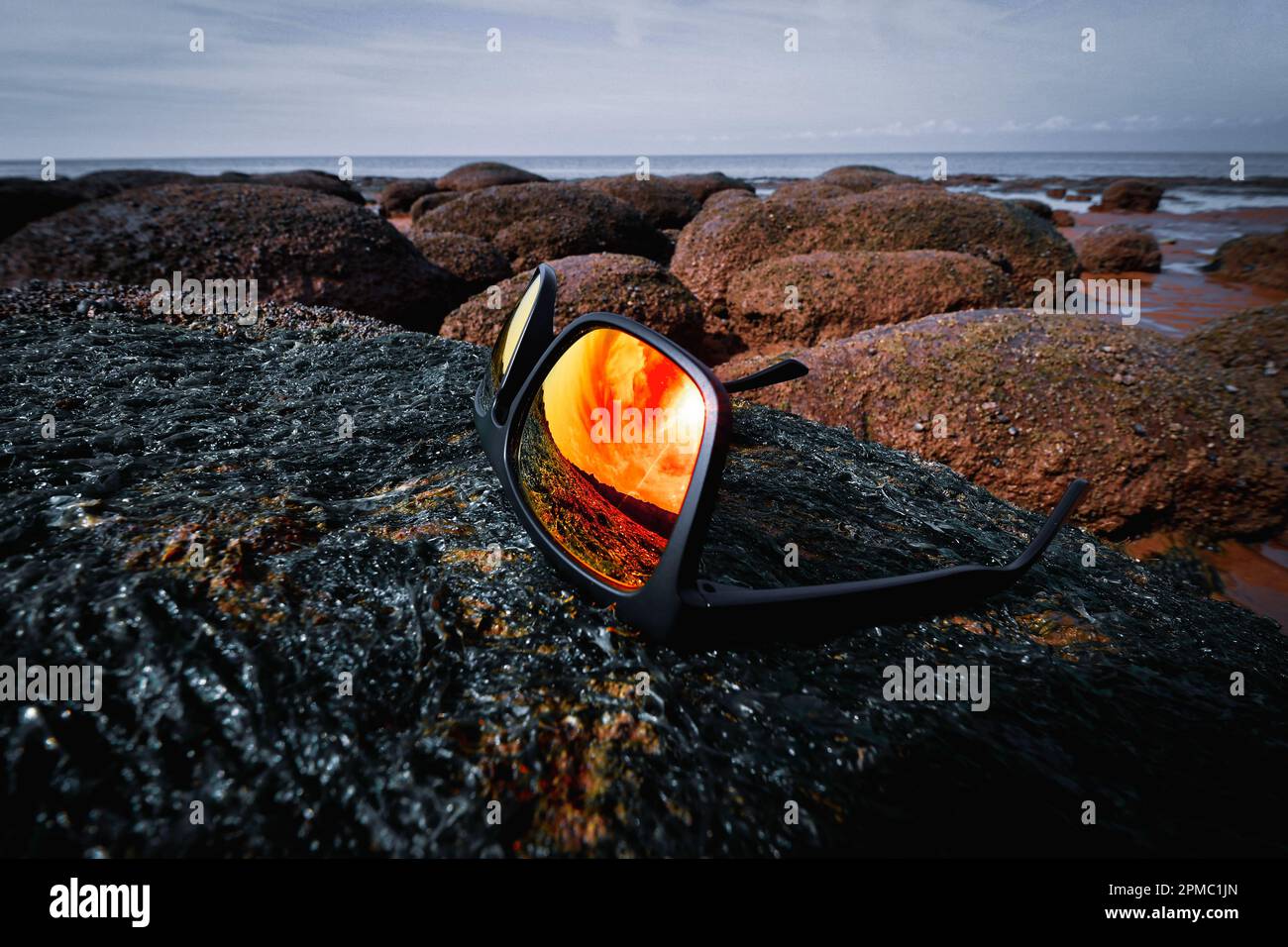 Sun reflection in the sunglasses Hunstanton Beach Stock Photo