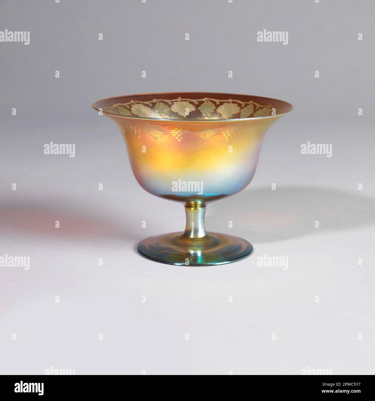 Stemmed Sherbet Dish (USA); Designed by Louis Comfort Tiffany (American, 1848–1933); favrile glass Stock Photo