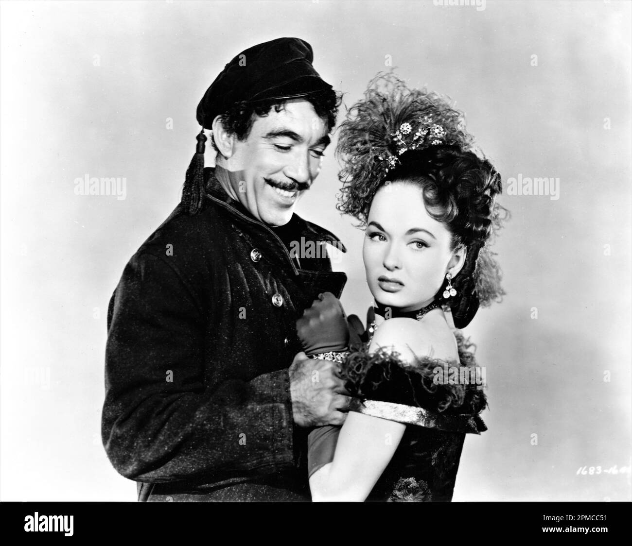 ANTHONY QUINN and ANN BLYTH in THE WORLD IN HIS ARMS 1952 director