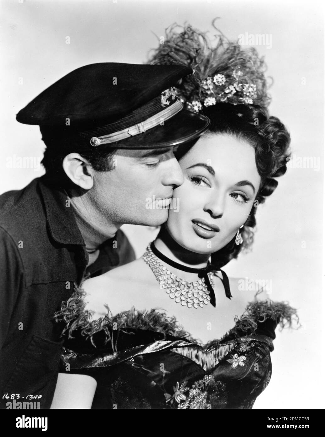 GREGORY PECK and ANN BLYTH Portrait in THE WORLD IN HIS ARMS 1952