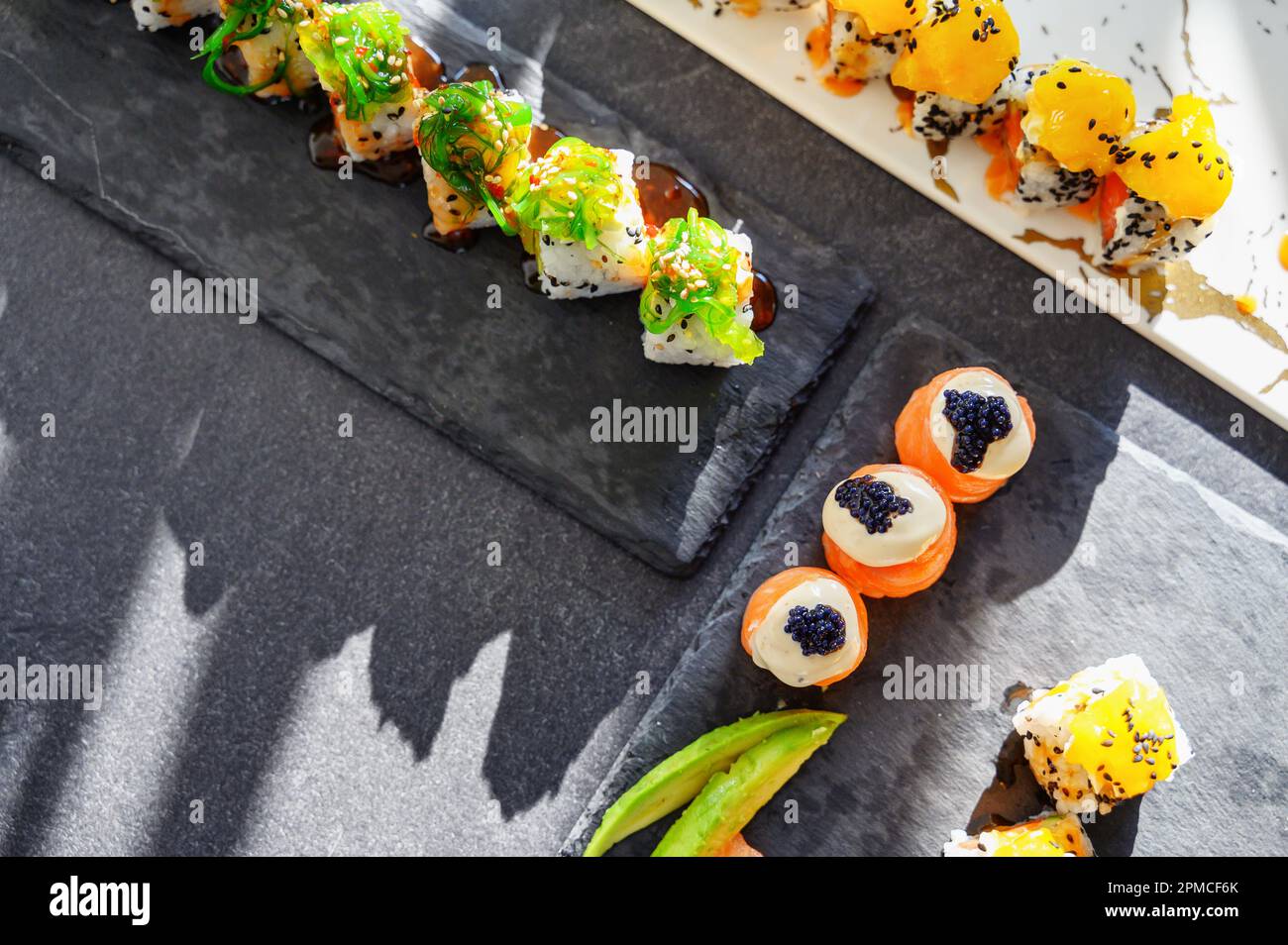 Close up of tasty japanese uramaki sushi with salmon Stock Photo