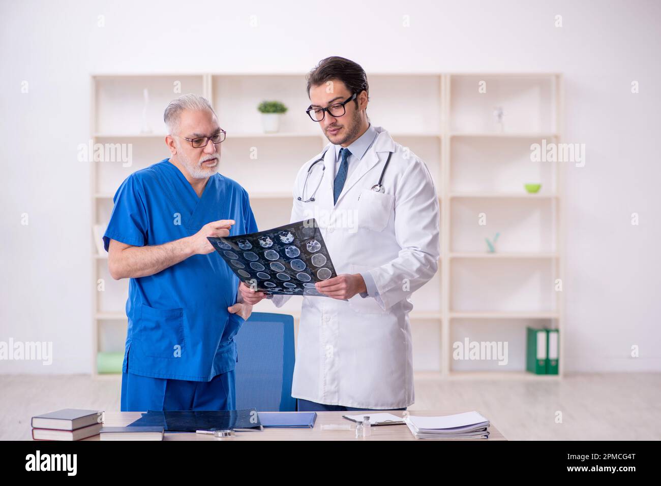 Two doctors radiologists working at the hospital Stock Photo Alamy