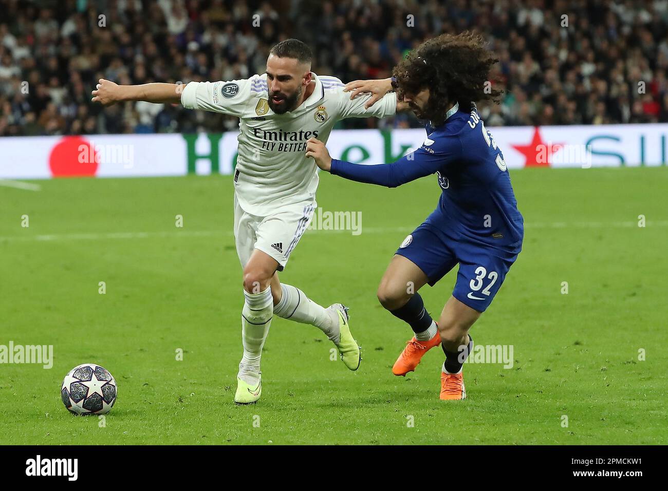 Madrid, Spain. 11th Apr, 2023. Real Madrid´s Real Madrid´s Daniel Carvajal (L) and Chelsea´s Cucurella (R) in action during Champions League Match Day 9 between Real Madrid CF and Chelsea FC at Santiago Bernabeu Stadium in Madrid, Spain, on April 12, 2023. Credit: Edward F. Peters/Alamy Live News Stock Photo