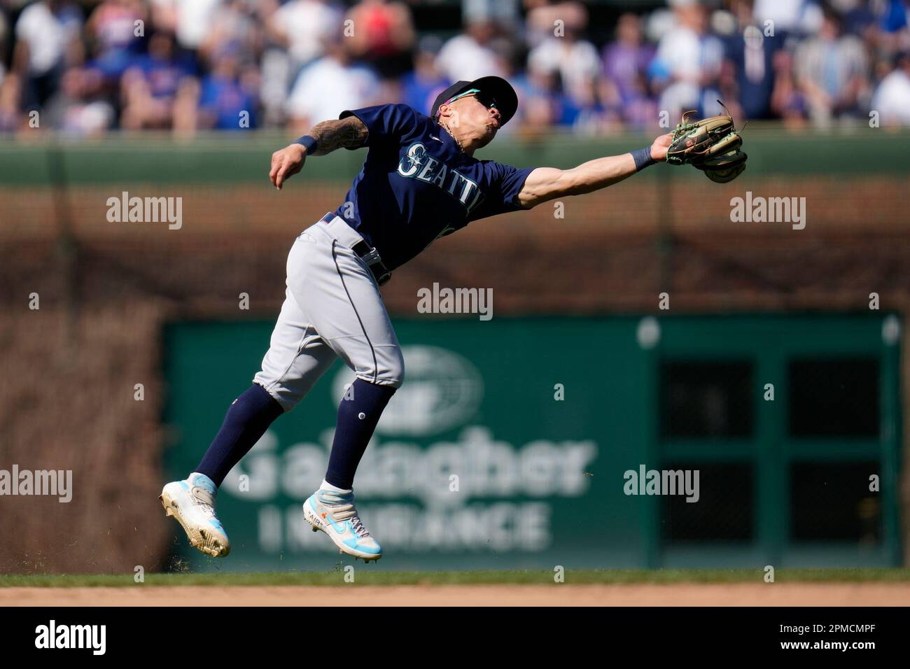 Chicago Cubs first baseman Trey Mancini (36) hits a single to