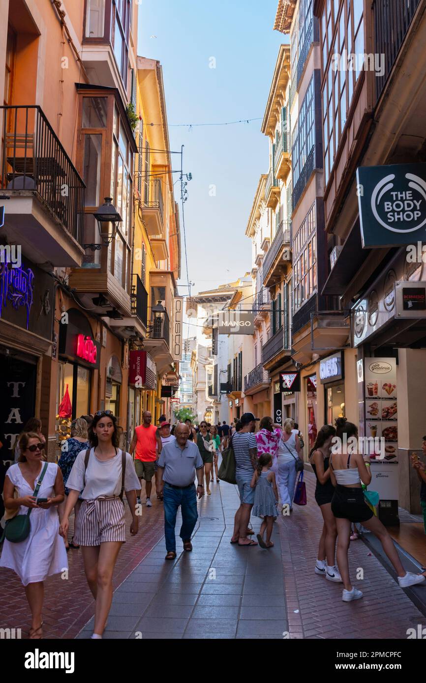 Palma, Mallorca, Balearic Islands, Spain. July 21, 2022 - San Miguel street, narrow pedestrian shopping street, in the old town, busy with people walk Stock Photo