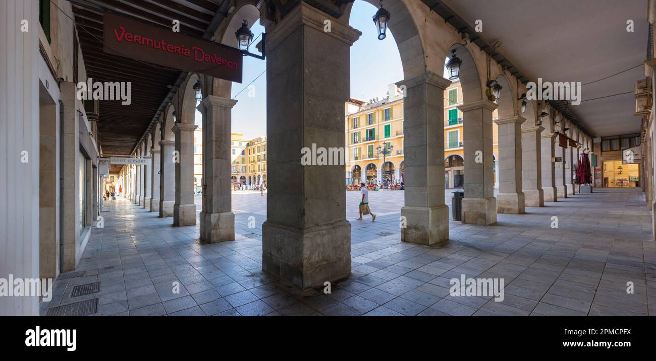Palma, Mallorca, Balearic Islands, Spain. July 21, 2022 - Arches under the buildings of the Plaza Mayor in Palma, the main square surrounded by arcade Stock Photo
