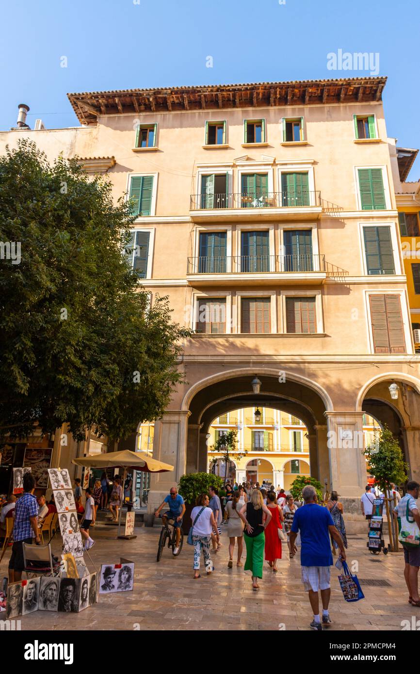 Palma, Mallorca, Balearic Islands, Spain. July 21, 2022 - One of the pedestrian streets with great atmosphere that give access to the main square of P Stock Photo