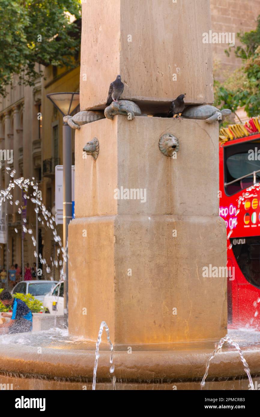 Palma, Mallorca, Balearic Islands, Spain. July 21, 2022 - Detail of the Fuente de las Tortugas, a fountain with an obelisk on turtle figures, in the P Stock Photo
