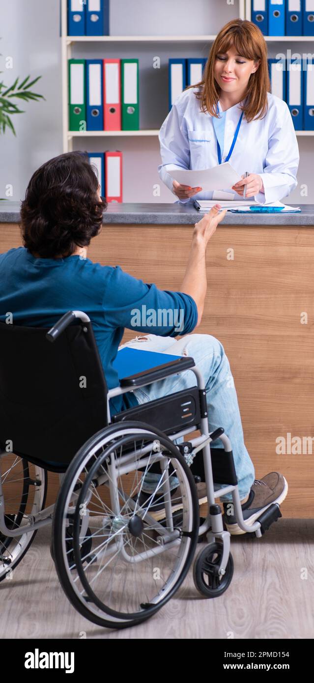 Random Hospital Reception The young patient at the reception in the hospital Stock Photo - Alamy