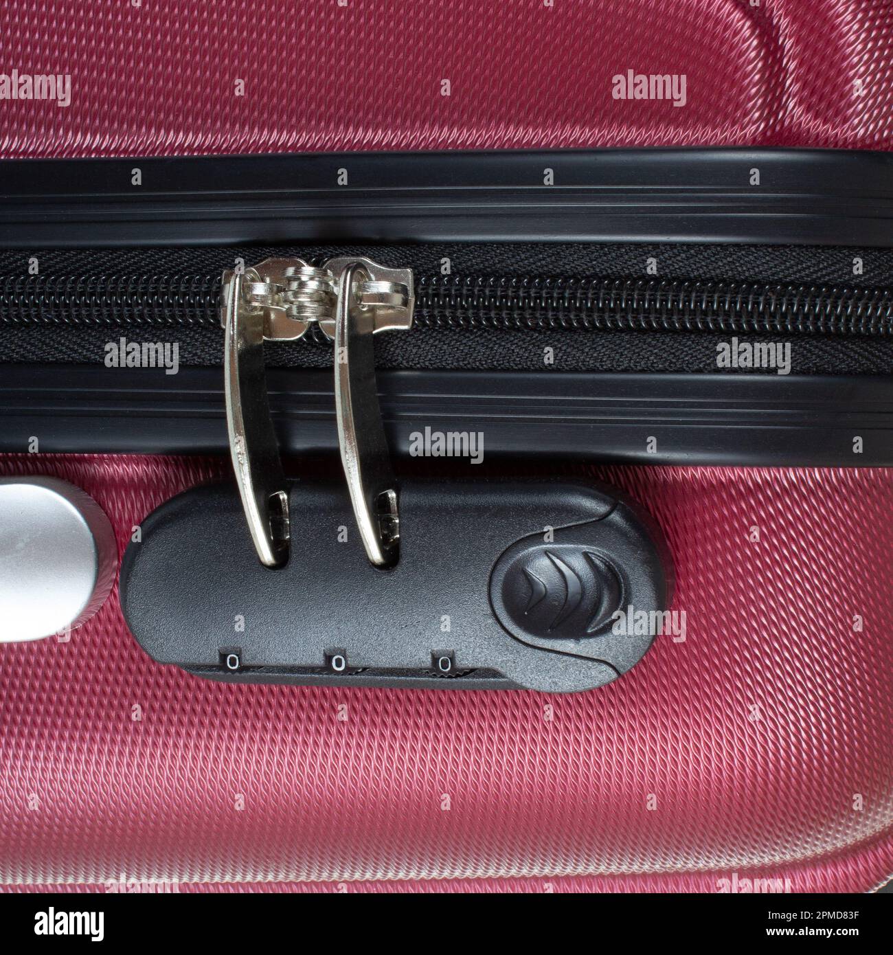 Close-up of zipper with code lock. Safety of things in a travel bag Stock Photo