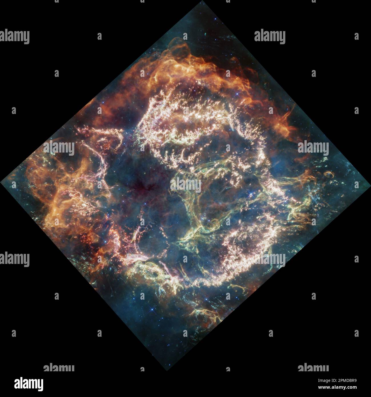The explosion of a star is a dramatic event, but the remains that the star leaves behind can be even more dramatic. A new mid-infrared image from NASA's James Webb Space Telescope provides one stunning example. It shows the supernova remnant Cassiopeia A (Cas A), created by a stellar explosion 340 years ago. The image displays vivid colors and intricate structures begging to be examined more closely. Cas A is the youngest known remnant from an exploding, massive star in our galaxy, offering astronomers an opportunity to perform stellar forensics to understand the star's death.Cassiopeia A (Cas Stock Photo