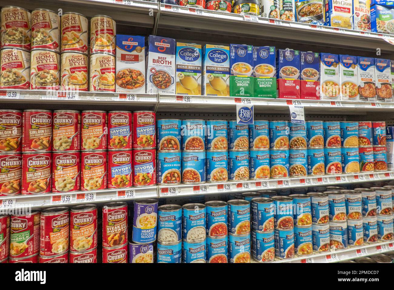 Shelves full of cans of soups in a small grocery store in the Adirondack Mountains, NY USA Stock Photo